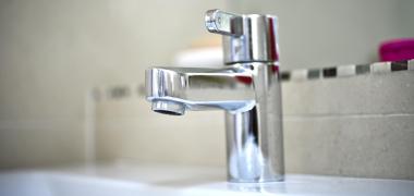 A silver bathroom tap