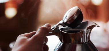Lid of a milk jug being opened